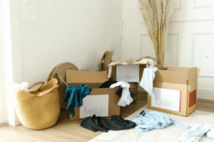 Labeled cardboard boxes used for organizing and decluttering before listing a house for sale