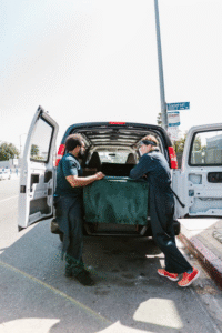 College students loading furniture into a van during move-out week