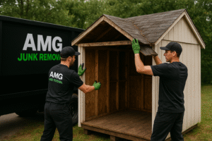 Junk removers dismantling a shed.