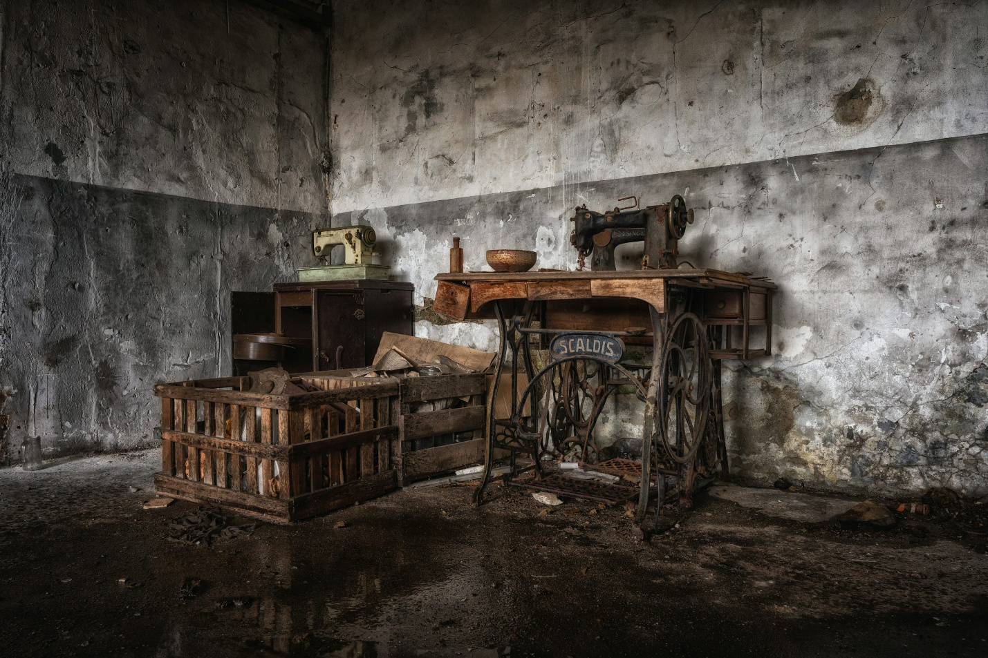 Dusty sewing machines and clutter in need of junk removal.