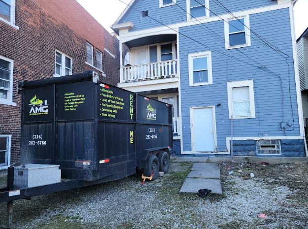 A large house with a truck parked outside. 