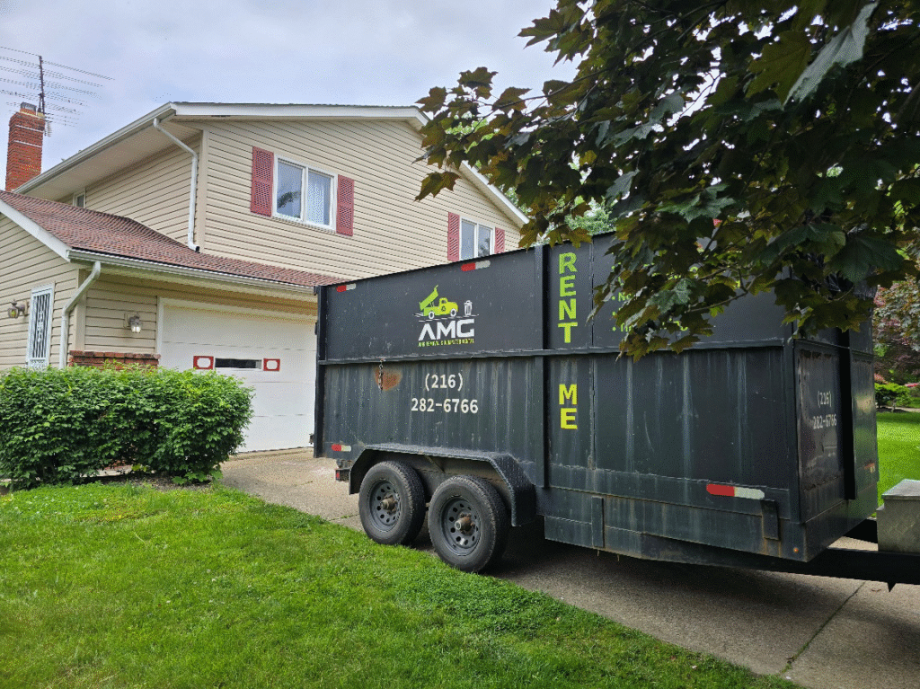 AMG Junk Removal garage cleanout and dumpster rental in the Cleveland suburbs.
